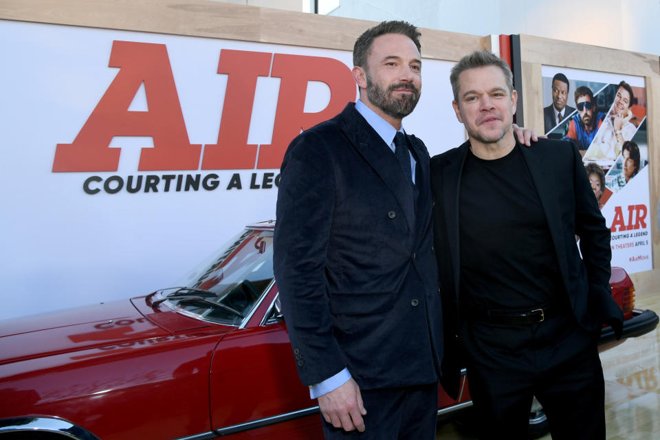 Ben and Matt standing together at a media event