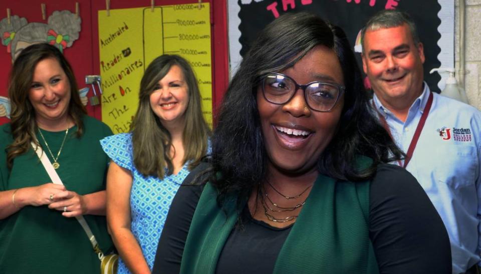 Tasha Morman, who teaches fifth-grade science and social studies at St. Marys Road Magnet Academy in Columbus, front, was notified in her classroom Friday morning she is one of three finalists for Muscogee County School District 2023 Teacher of the Year. 04/14/2023