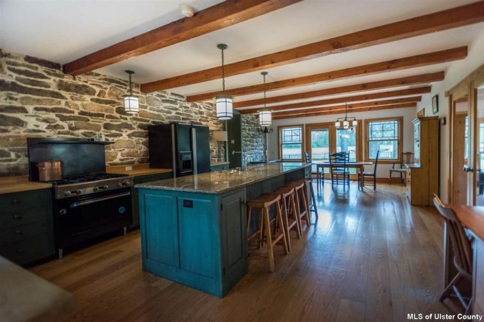 Beamed ceilings over the kitchen.