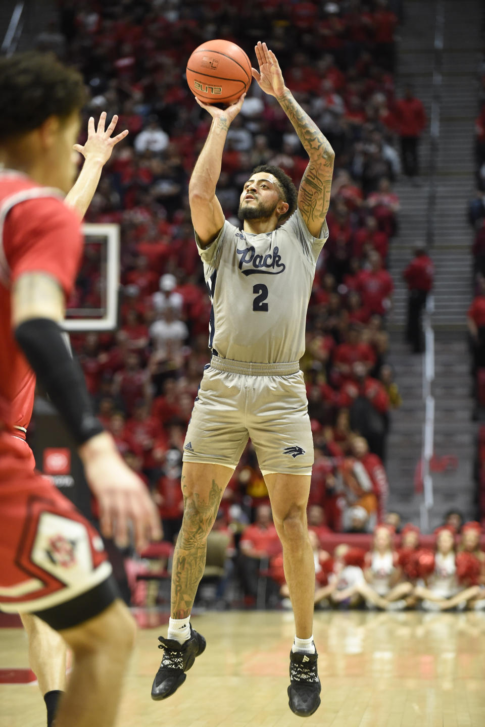 Nevada guard Jalen Harris (2) shoots during the first half of an NCAA college basketball game against San Diego State, Saturday, Jan. 18, 2020, in San Diego. (AP Photo/Denis Poroy)