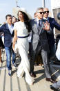 <p>During the couple’s whirlwind trip to Venice to tie the knot in September, 2014, Amal stunned in a white pantsuit. <i>(Photo by Ernesto Ruscio/GC Images)</i></p>