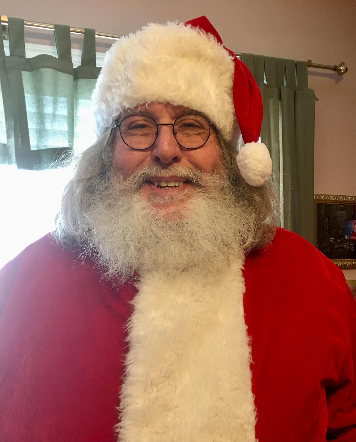 Former Gadsden Police Chief John Crane, who now is interim director at the Humane Society Pet Rescue and Adoption Center, says playing Santa Claus is the best job he's had.