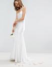 <p><a rel="nofollow noopener" href="http://www.asos.com/asos/asos-bridal-cami-paneled-fishtail-maxi-dress/prd/7435615" target="_blank" data-ylk="slk:ASOS, £120;elm:context_link;itc:0;sec:content-canvas" class="link "><i>ASOS, £120</i></a> </p>