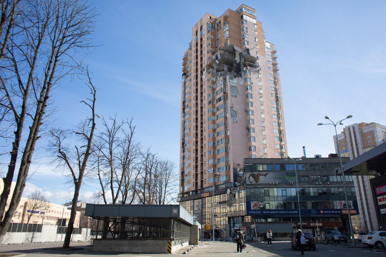 A view to the apartment block on 6A Lobanovsky Ave. that was hit with a missile on Feb. 26, 2022, in Kyiv, Ukraine. A residential building was hit as missile strikes were reported around Kyiv on the second night of Russia’s invasion of Ukraine, which has killed scores and prompted widespread condemnation from U.S. and European leaders.