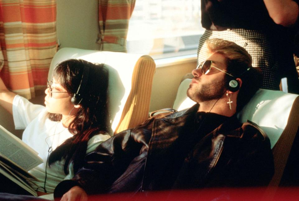 George Michael and Kathy Yeung listened to music during a tour stop in Japan in 1988.