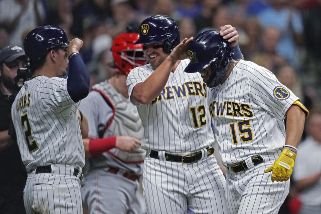 Former Milwaukee Brewers Robin Yount and Rollie Fingers, right