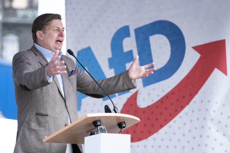 Maximilian Krah, Alternative for Germany (AfD) lead candidate for the European elections, speaks at a rally organized by his party on Schlossplatz. An employee of a German member of the European Parliament, lawmaker Maximilian Krah, has been detained in Dresden on suspicion of spying for China, according to security sources. Sebastian Kahnert/dpa