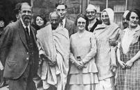 Group photograph taken at Marseilles in France 1931: C. F. Andrews, Gandhi, Miss Muriel Lester, Mahadev Desai, Madeleine Slade (Mirabehn), Pyarelal and an English friend. Mohandas Gandhi (1869 Ð 1948) was the preeminent leader of the Indian independence movement in British-ruled India. (Photo by: Universal History Archive/Universal Images Group via Getty Images)