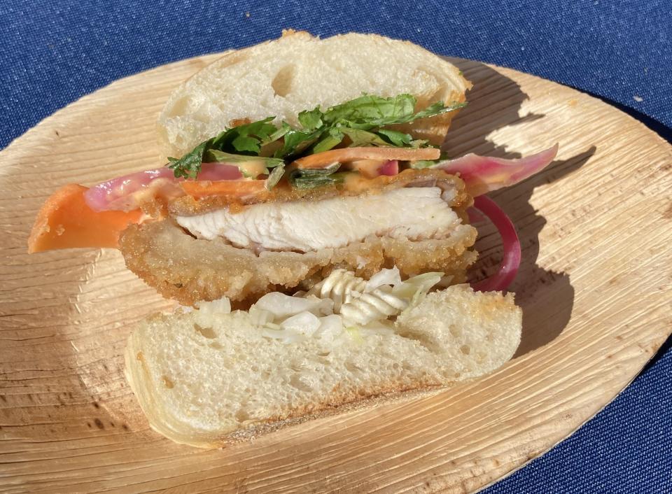 Wilmington chef Mandy Chow offered samples of her The Crouching Chicken sandwich for the Own Your Own contest in Burgaw. ALLISON BALLARD/STARNEWS FILE PHOTO