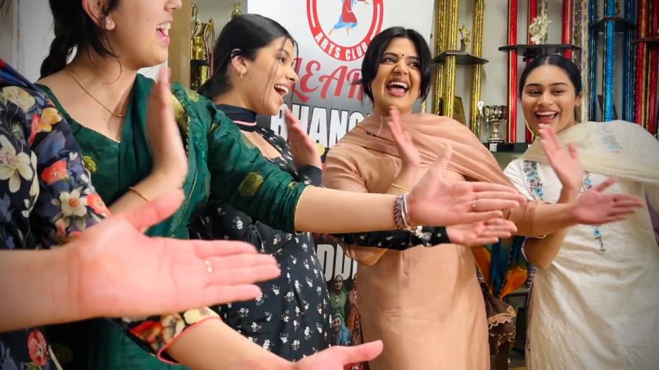 Jasmine Kaur Sidhu (second from right) was a giddha student at the Shar-E-Punjab Arts Club in Surrey, B.C., before she became a coach. Now she is helping others learn Punjabi vocabulary and emotions behind the words through the traditional giddha dance. 