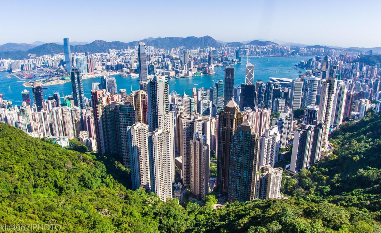 Looking across Hong Kong Central, Victoria Harbor, and Kowloon from "The Peak" observation platform.