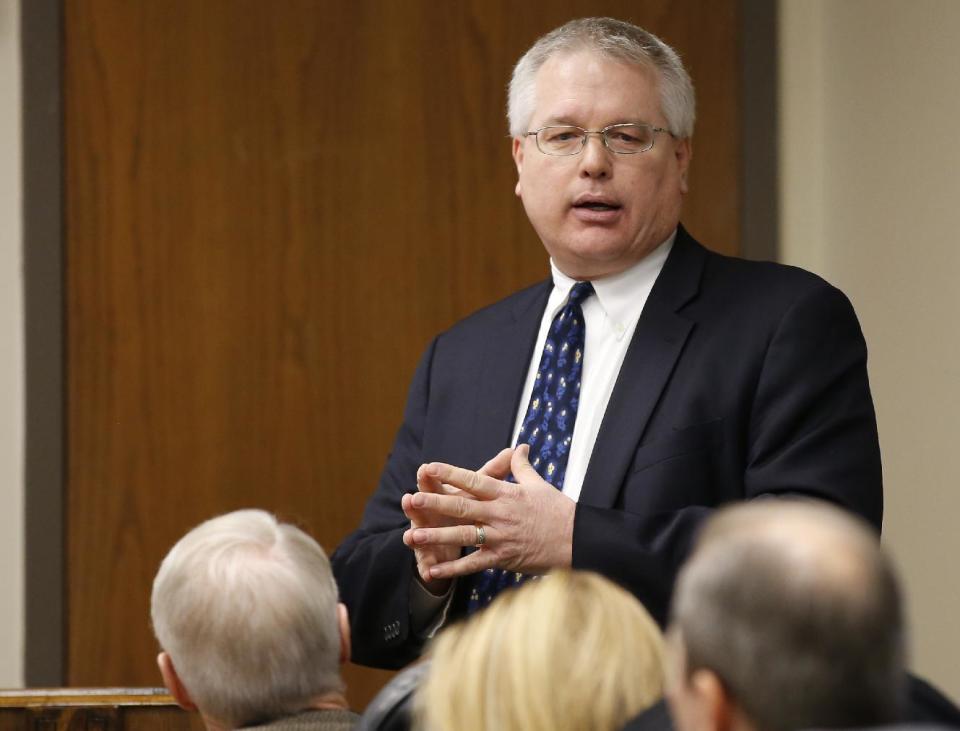 Donald Maisch, general counsel for the Oklahoma State Department of Health, explains the proposed rules for the Humanity of the Unborn Child Act to Health Department board members during a meeting in Oklahoma City, Tuesday, Dec. 13, 2016. Oklahoma plans to force hospitals, nursing homes, restaurants and public schools to post signs inside public restrooms directing pregnant women where to receive services as part of an effort to reduce abortions in the state. (AP Photo/Sue Ogrocki)