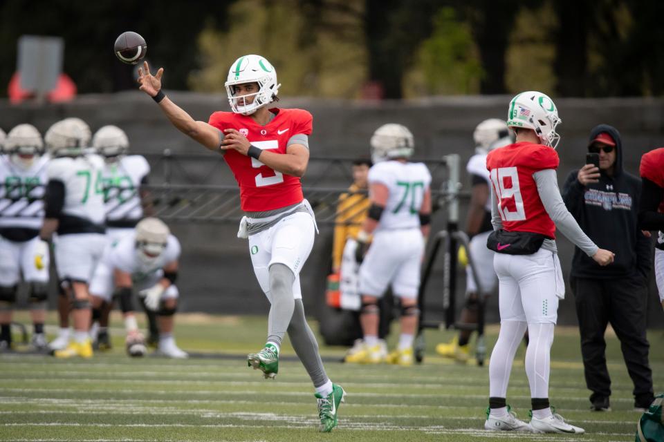 Oregon quarterback Dante Moore throws during practice with the Oregon Ducks on Saturday, April 6, 2024, at the Hatfield-Dowlin Complex in Eugene, Oregon.