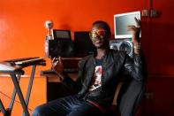 Music producer Keynote Adeosun poses for a picture in his recording studio in the Festac district of Lagos, Nigeria, May 17, 2016. REUTERS/Joe Penney