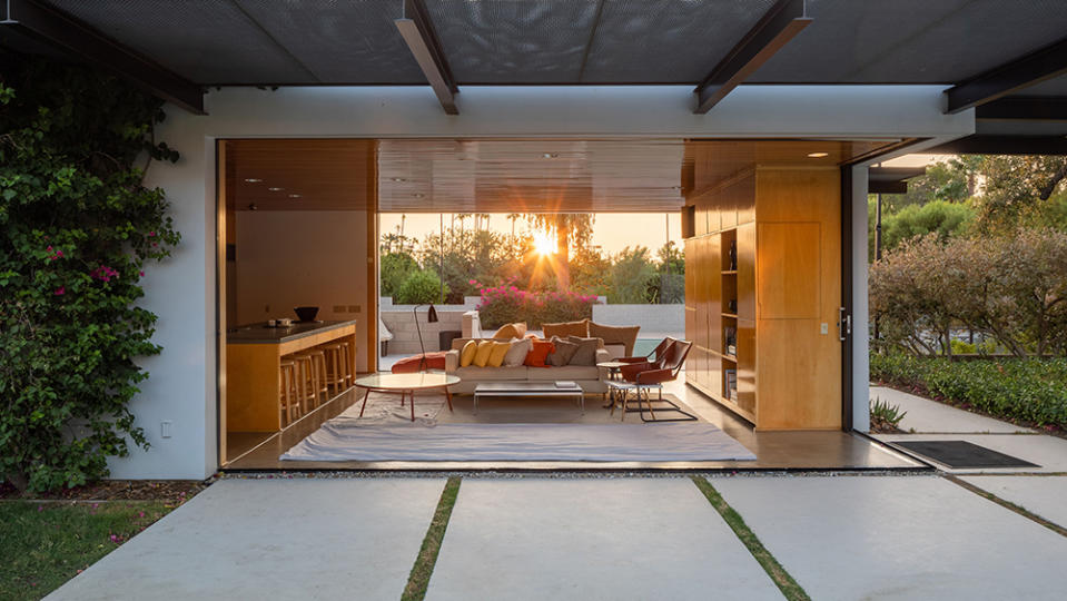 An open living area opens onto the deck and pool. - Credit: Photo: Daniel Solomon/Vista Sotheby's International Realty