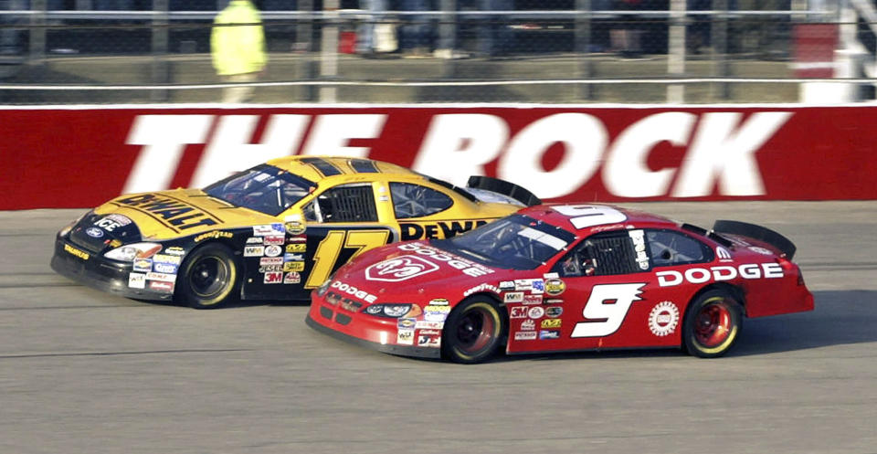 FILE - Matt Kenseth (17) beats Kasey Kahne (9) to the finish line to win the NASCAR Cup Series auto race at North Carolina Speedway near Rockingham, N.C., Feb. 22, 2004. Rockingham is a rural track that lost its place on the NASCAR schedule as the sport gravitated toward larger and more profitable markets. (AP Photo/Bob Jordan, File)