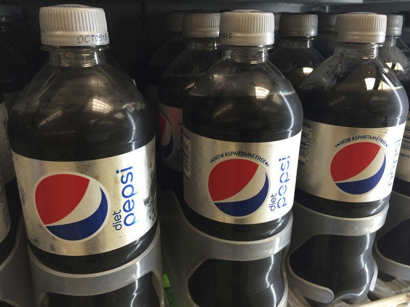 Candice Choi | Associated PressBottles of Diet Pepsi with, left, and without aspartame, center and right, sit in a case Aug. 8 at a store in New York.