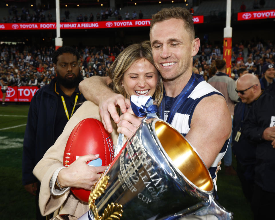 Joel Selwood, pictured here celebrating with partner Brit Davis after the AFL grand final.