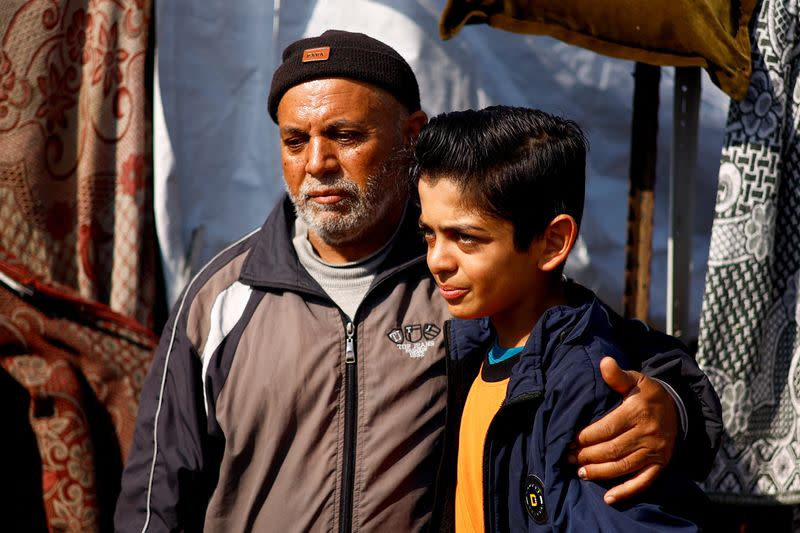 Displaced 'Gaza Newton' lights up his tent with wind energy amid power cut