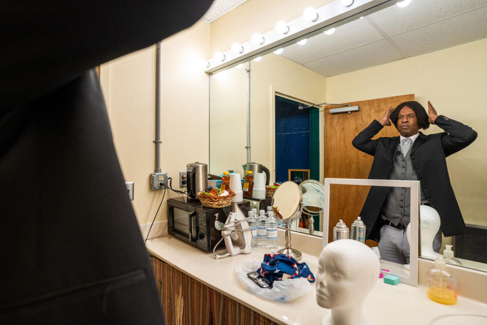 Darius Wallace gets ready for his performance in his dressing room on Feb. 17, 2024 in Easton, Md. (André Chung for NBC News)