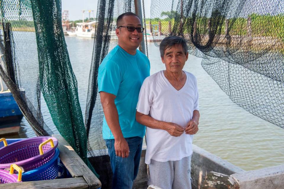 Elvis Ta and his father Sau Truong on Truong’s shrimping boat, Miss Mimi, at Bayou Caddy in Bay St. Louis on Thursday, June 29, 2023.
