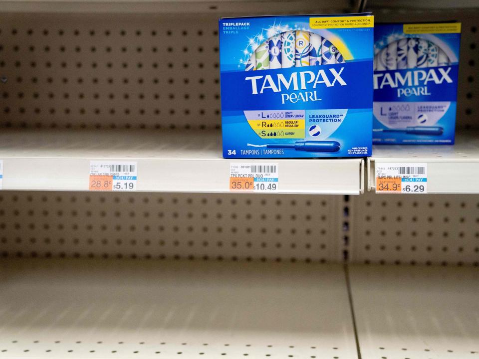 Two boxes of Tampax Pearl tampons are seen on a shelf at a store in Washington, DC, on June 14, 2022
