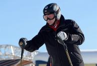 Russian President Vladimir Putin skies at the mountain resort of Krasnaya Polyana near the Black Sea resort of Sochi, southern Russia, Friday, Jan. 3, 2014. (AP Photo/RIA-Novosti, Alexei Nikolsky, Presidential Press Service)