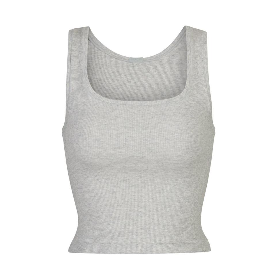 <p><a href="https://go.redirectingat.com?id=74968X1596630&url=https%3A%2F%2Fskims.com%2Fproducts%2Fcotton-rib-tank-light-heather-grey%3Fvariant%3D39317923889284%26glCountry%3DUS%26glCurrency%3DUSD%26gclid%3DCjwKCAjwwb6lBhBJEiwAbuVUStiX2-3YZ9t2-aatpj4k5Wpd4Qz28fkGBkMuKcuSuuDAgde8OilmShoCuIAQAvD_BwE&sref=https%3A%2F%2F" rel="nofollow noopener" target="_blank" data-ylk="slk:Shop Now;elm:context_link;itc:0;sec:content-canvas" class="link ">Shop Now</a></p><p>COTTON RIB TANK</p><p>$36.00</p><p>skims.com</p>