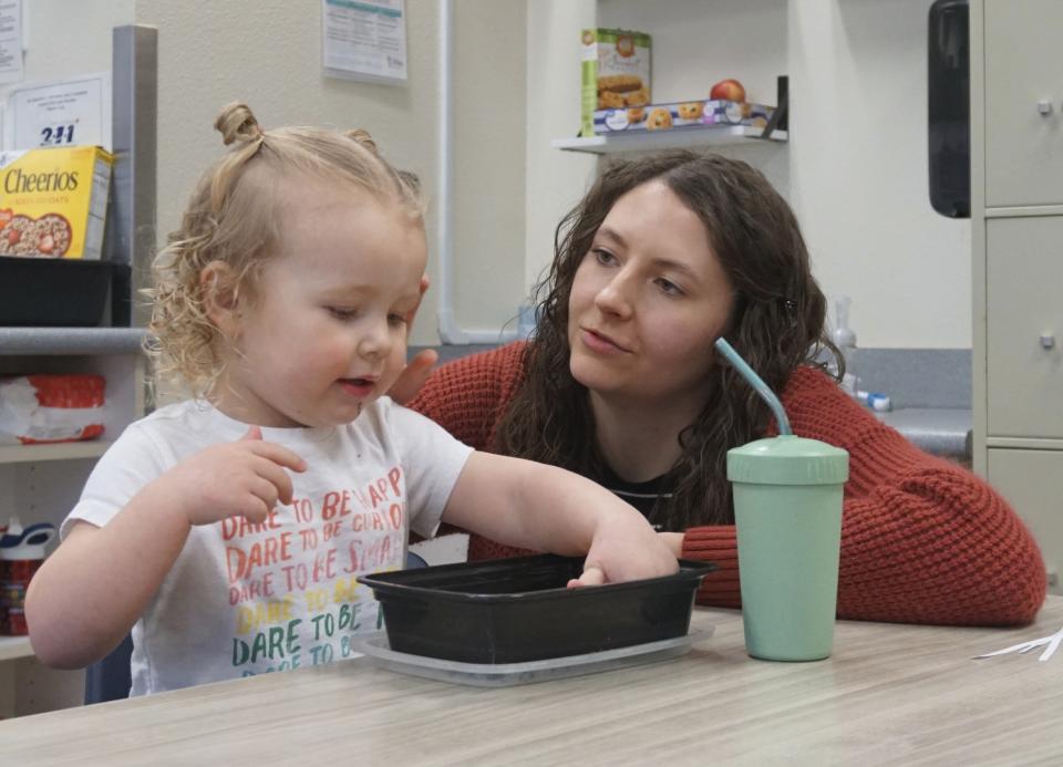 Teacher Lexy Birnel, right, says goodbye to daughter Amelia, 2, before starting her day teaching at Endeavor Elementary on Feb. 29, 2024, in Nampa, Idaho. (Carly Flandro/Idaho Education News via AP)