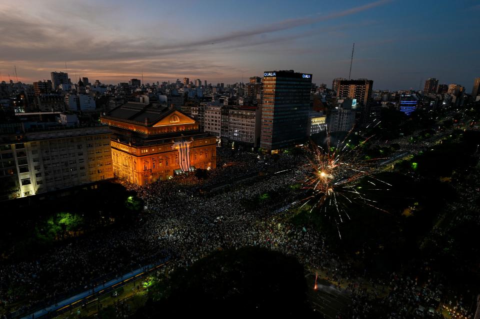 In this aerial view fans of Argentina celebrate winning the Qatar 2022 World Cup against France at 9 de Julio avenue in Buenos Aires, on December 18, 2022. (Photo by Luis ROBAYO / AFP) (Photo by LUIS ROBAYO/AFP via Getty Images)