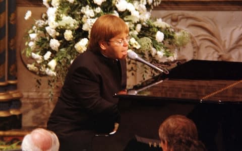 Elton John sings at the funeral - Credit:  PA Archive