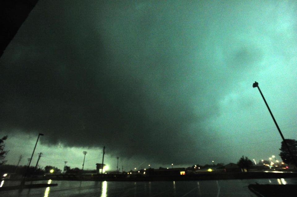 A rain-wrapped tornado passes through Hazel Green, Ala. as multiple tornadoes raked across northern Madison County late afternoon Monday, April 28, 2014. (AP Photo/AL.com, Eric Schultz)