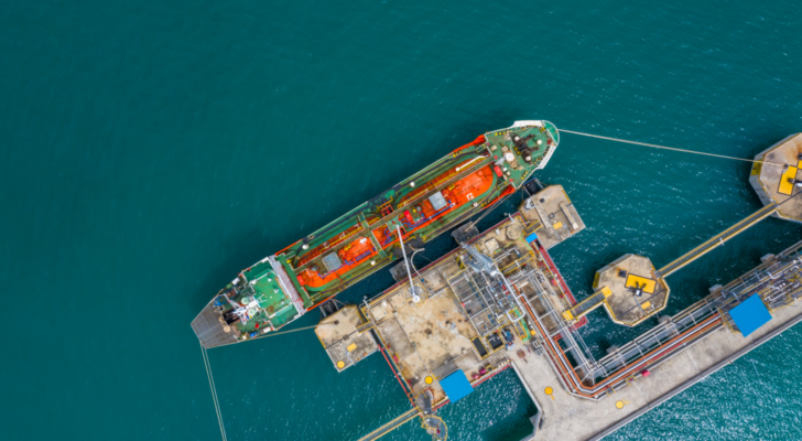 Ship tanker gas LPG, Aerial view Liquefied Petroleum Gas (LPG) tanker, Tanker ship logistic and transportation business oil and gas industry, Loading arm oil and gas offshore platforms.