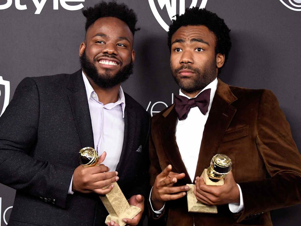 <p>Frazer Harrison/Getty</p> Stephen Glover and Donald Glover at the 18th Annual Post-Golden Globes Party in 2017 