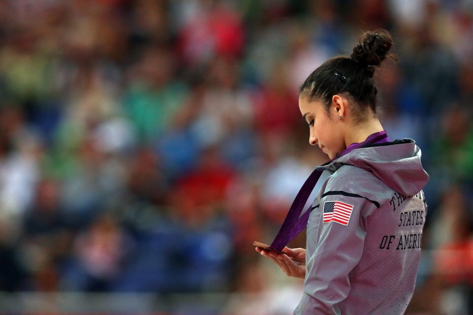 Hair can't touch the back of a gymnast's neck.