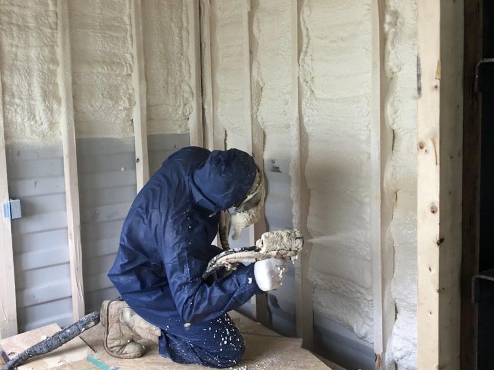 Spray foam insulation being added to the interior walls.