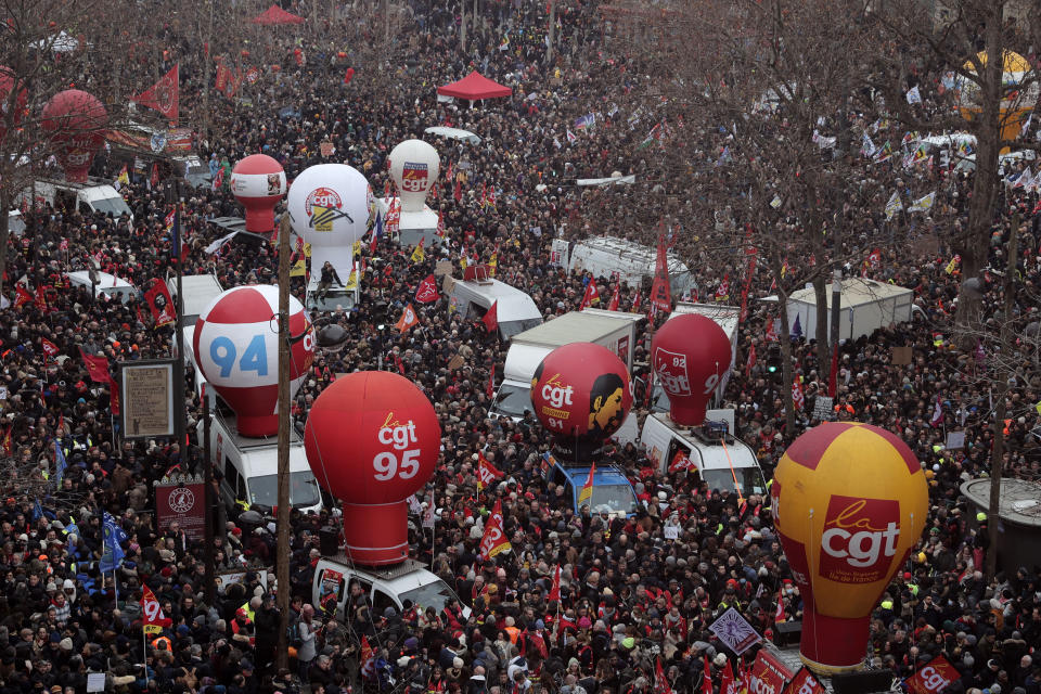 FILE- People gather on Place de la Republique during a demonstration against proposed pension changes, Thursday, Jan. 19, 2023 in Paris. France's prime minister insisted that the government's plan to raise the retirement age from 62 to 64 is "no longer negotiable," further angering parliamentary opponents and unions that plan new mass protests and disruptive strikes Tuesday. (AP Photo/Lewis Joly, File)