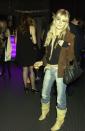 <p>Sienna Miller's chunky leather boots, flashy belt, and light wash denim were completely on-point for a launch party in fall 2003.</p>