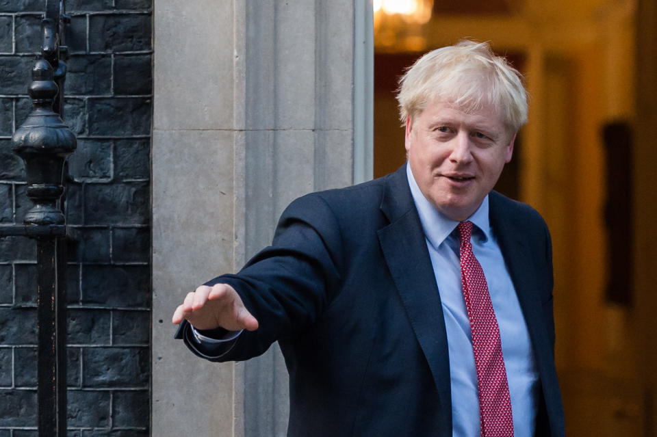 LONDON, UNITED KINGDOM - OCTOBER 08: British Prime Minister Boris Johnson stands on the steps of 10 Downing Street ahead of the meeting with European Parliament President David Sassoli (not pictured) on 08 October 2019 in London, England. (Photo credit should read Wiktor Szymanowicz / Barcroft Media via Getty Images)