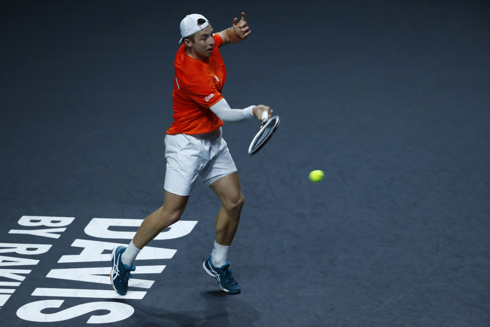 Netherland's Tallon Griekspoor returns the ball to Australia's Jordan Thompson during a Davis Cup quarter-final tennis match between Australia and The Netherlands in Malaga, Spain, Tuesday, Nov. 22, 2022. (AP Photo/Joan Monfort)