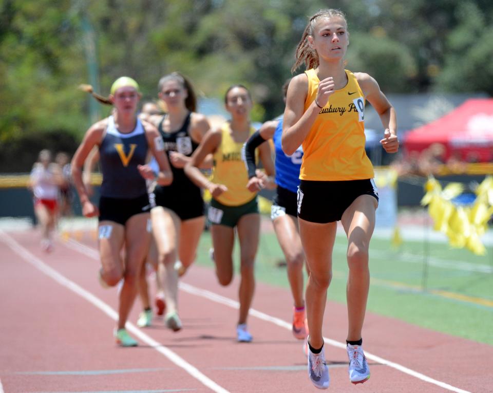 Newbury Park's Sam McDonnell wins the girls 1,600-meter run during the CIF-Southern Section Masters Meet at Moorpark High on Saturday, May 21, 2022. Sadie Engelhardt of Ventura took third.