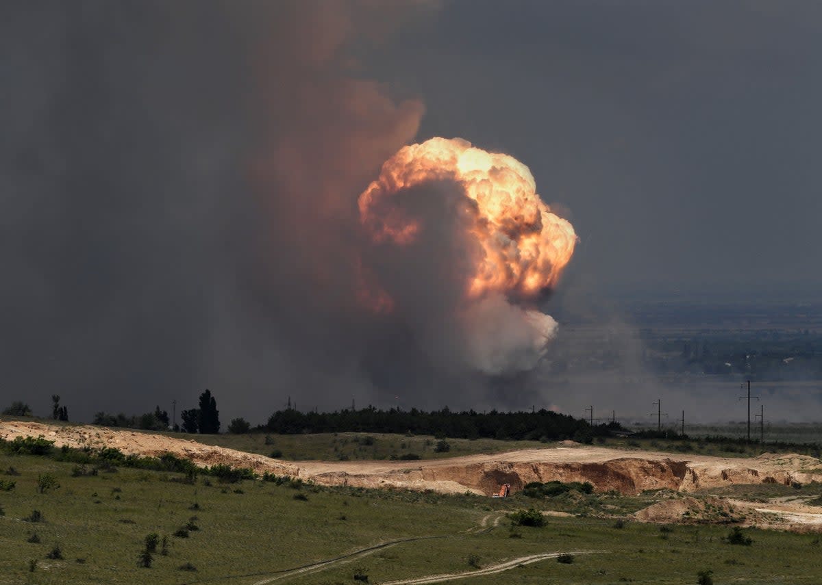 Detonation of ammunition caused by a fire at a military training field in Crimea (Kommersant Photo/AFP via Getty)