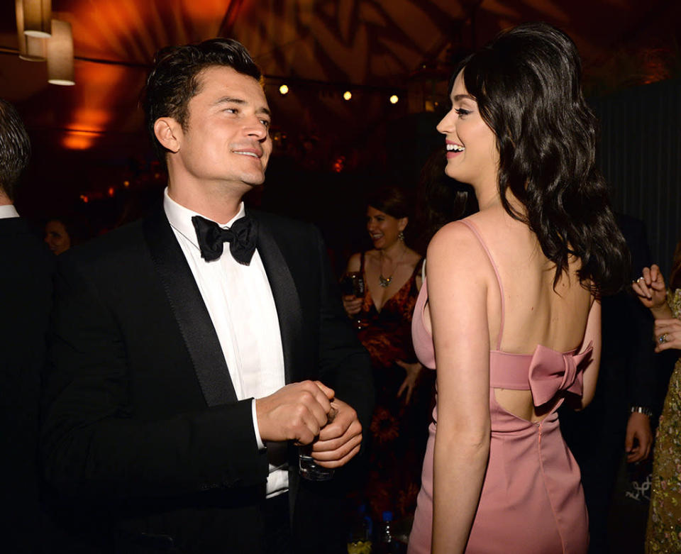 Watch out, John Mayer! Orlando Bloom was spotted getting flirty with Katy Perry at the Weinstein/Netflix shindig. (Photo: Getty Images)