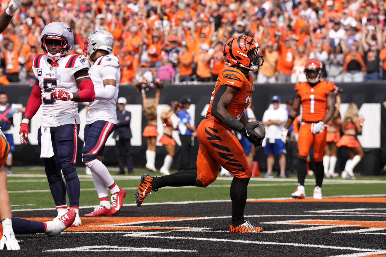 Cincinnati Bengals running back Zack Moss (31) celebrates after scoring on a 5-yard touchdown run during the second half of an NFL football game against the New England Patriots, Sunday, Sept. 8, 2024, in Cincinnati. (AP Photo/Jeff Dean)