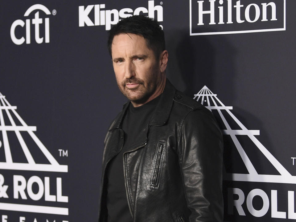 FILE - Trent Reznor arrives at the Rock & Roll Hall of Fame induction ceremony in New York on March 29, 2019. Reznor turns 56 on May 17. (Photo by Evan Agostini/Invision/AP, File)