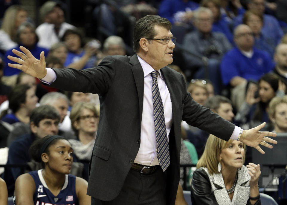 Connecticut head coach Geno Auriemma watches the action in the first half of an NCAA college basketball game against Memphis Saturday, Jan. 4, 2014, in Memphis, Tenn. (AP Photo/Mark Humphrey)