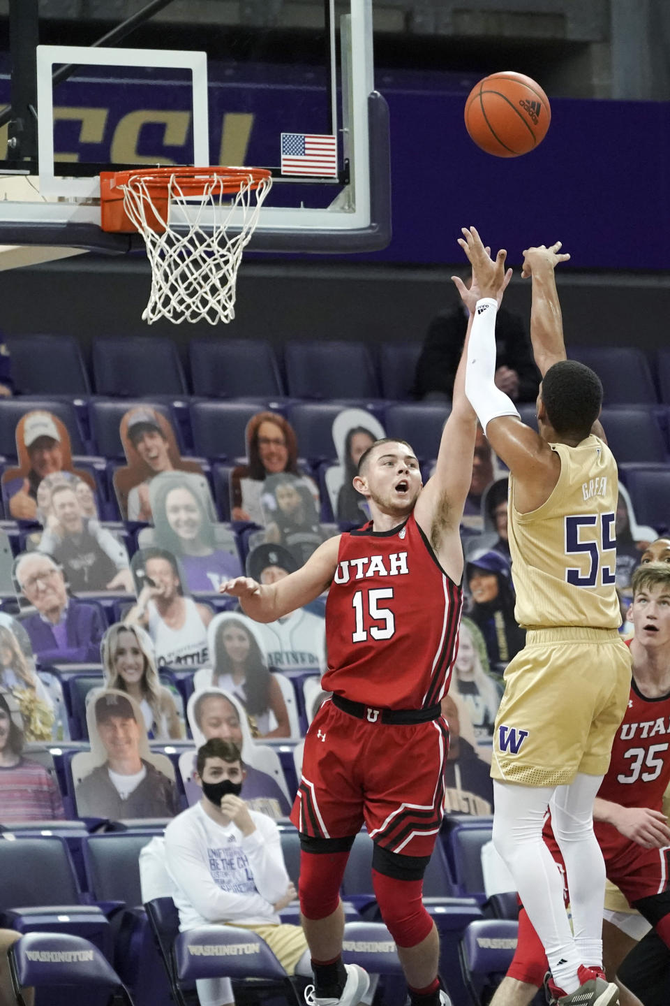 Washington guard Quade Green (55) shoots over Utah guard Rylan Jones (15) during the second half of an NCAA college basketball game, Sunday, Jan. 24, 2021, in Seattle. Washington won 83-79. (AP Photo/Ted S. Warren)