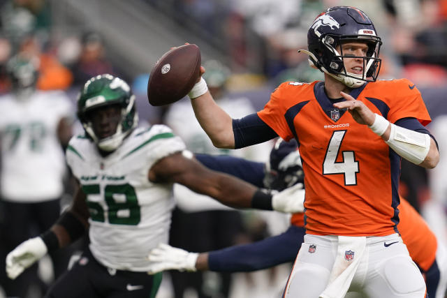 Denver Broncos quarterback Brett Rypien (4) works in the pocket against the New York Jets during the second half of an NFL football game, Sunday, Oct. 23, 2022, in Denver. The New York Jets won 16-9. (AP Photo/Matt York)