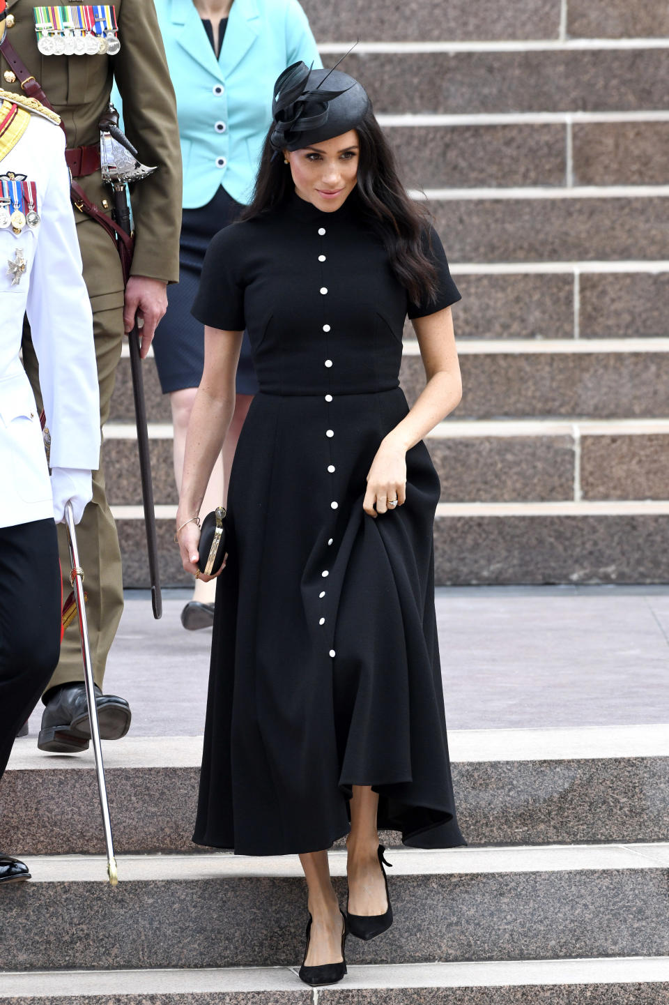 The duchess wears a black dress by Emilia Wickstead at the Anzac Memorial at Hyde Park in Sydney on Oct. 20, day five of the royal tour.