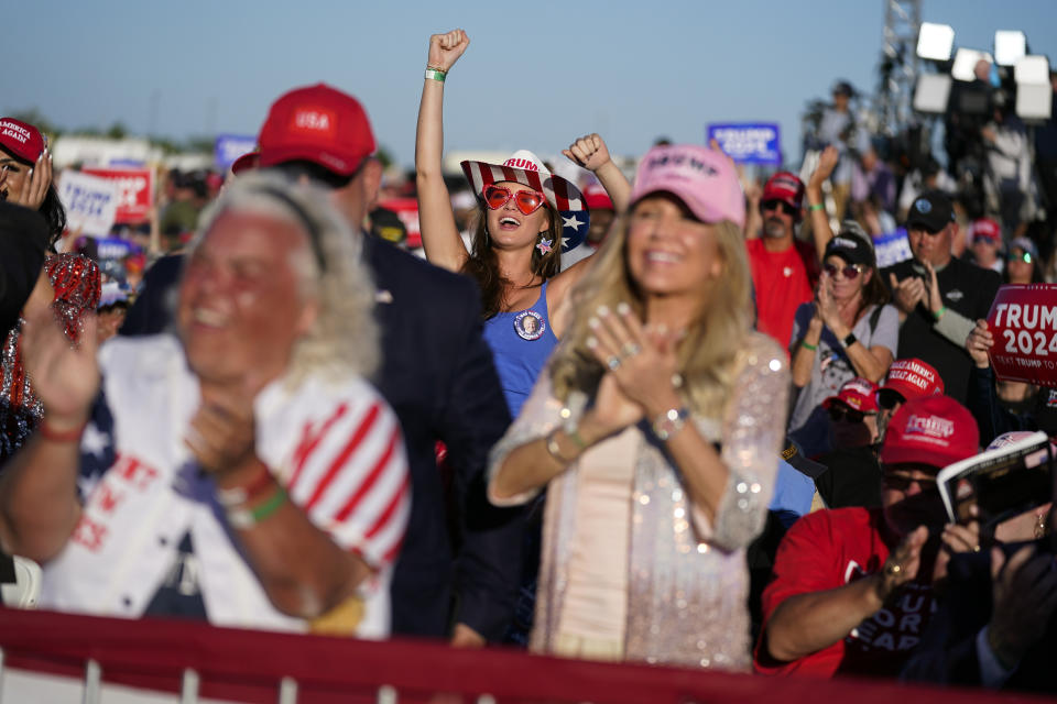 Supporters of former President Donald Trump cheer as he speaks at a campaign rally at Waco Regional Airport, Saturday, March 25, 2023, in Waco, Texas. (AP Photo/Evan Vucci)